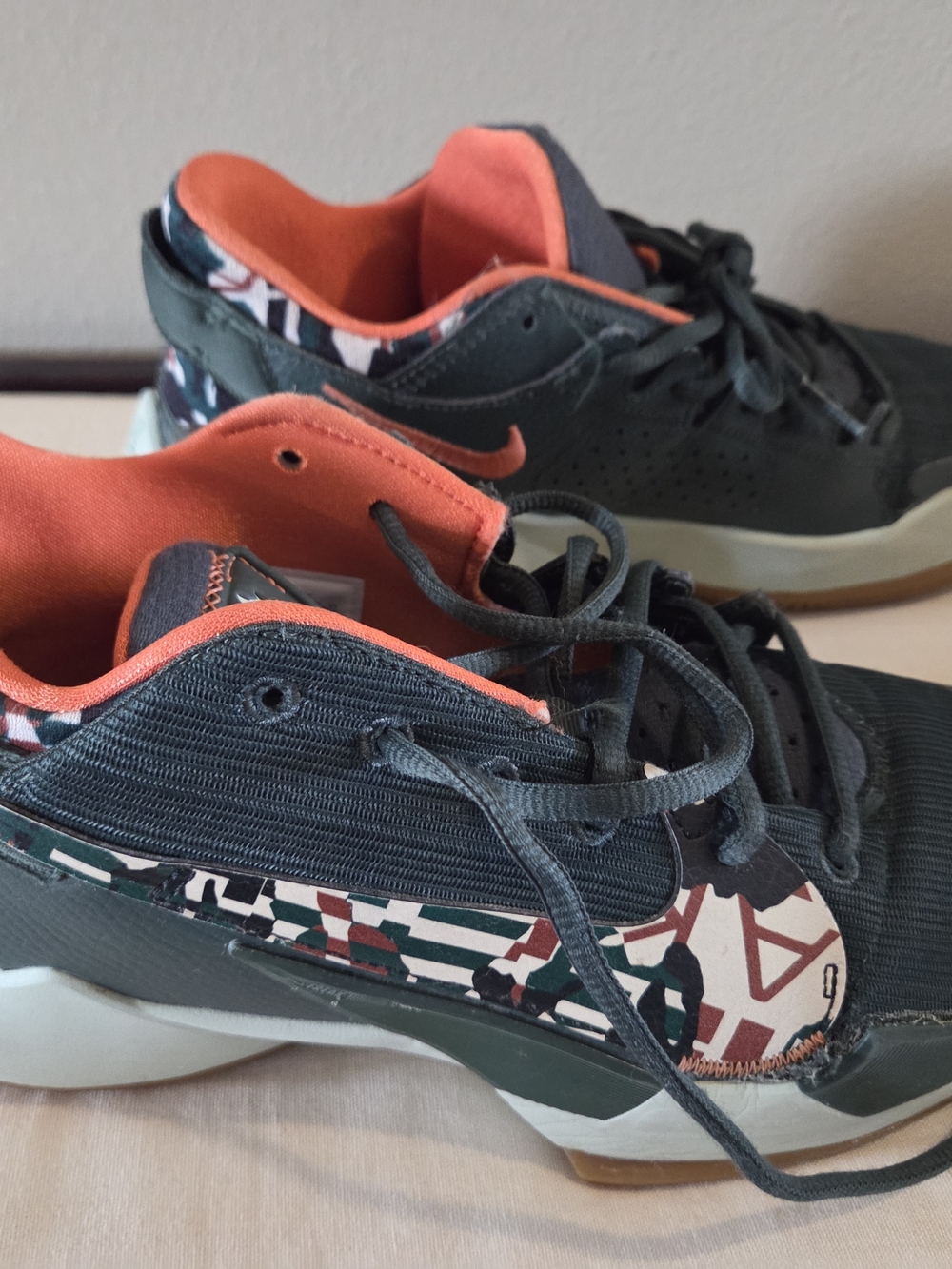 Nike Dark Green and Orange Athletic Sneakers with Patterned Swoosh